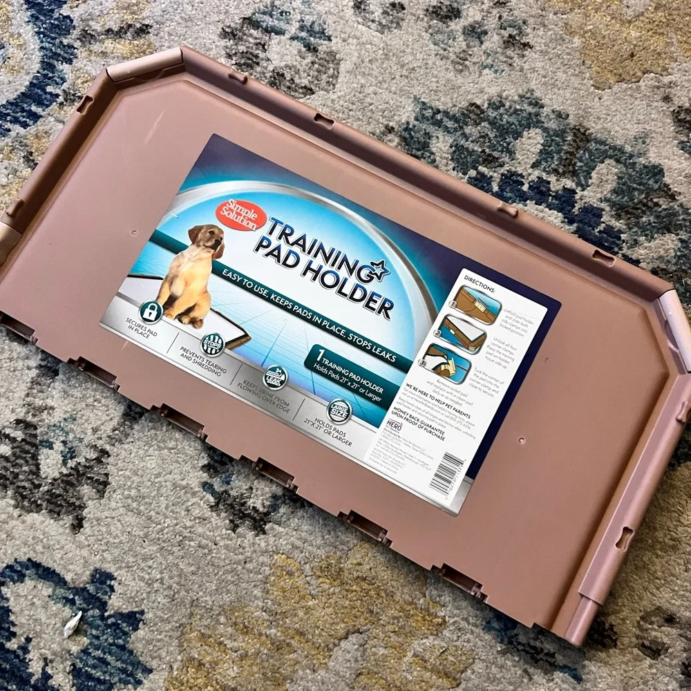 Training pad holder